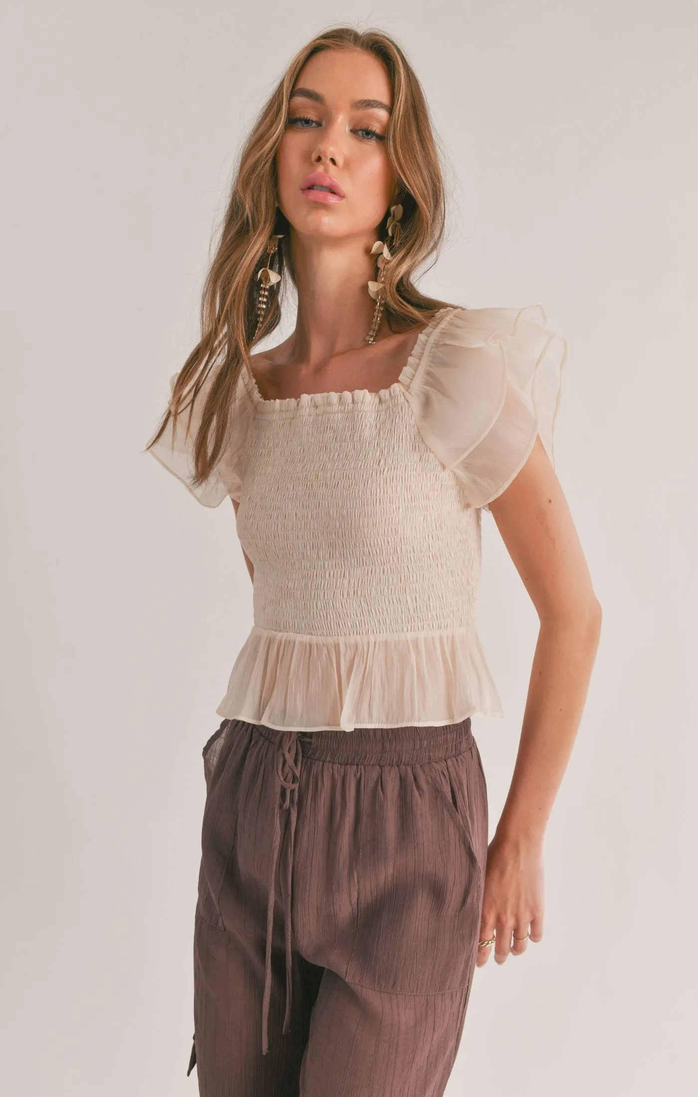 Blurred Smocked Ruffle Peplum Top